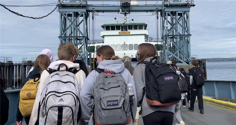 Students boarding a ferry